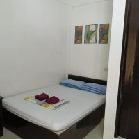 Chelle's apartelle-inn, hotel din El Nido