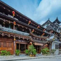 Huazhu Baihe Huagu Inn, хотел в Wangcun