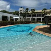 Flat com Piscina Guarajuba 2 Quartos 100m da Praia, hotel i Camacari