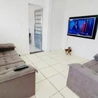 Casa individual aconchegante em bairro central, hotel u gradu 'Mogi das Cruzes'