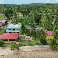 Harus Damai Inn โรงแรมในLagudri