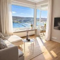 Strandhafer-Balkon mit Meerblick- 2 Min zum Strand، فندق في Schausende