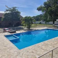 Apartamento em condominio Maranduba Ubatuba, хотел в Убатуба