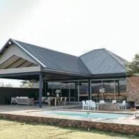 Stroomrivier Lodge, hotel in Boshoek
