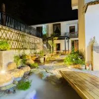 Autumn Shower Courtyard Twin Room โรงแรมในJiawan