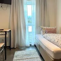 Compact single Room with Shared Bathroom ideal for travelers, hotel a Dingolfing