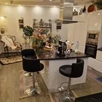 grand appartement la roche, хотел в Banzart