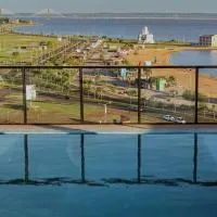Frente a la Playa San José, Vista Increíble al Río, hotell i Encarnación