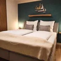 Nordseezimmer Koje - WLAN, Parkplatz, eigenes Bad, Fahrradschuppen, Rollladen, Hotel in Otterndorf