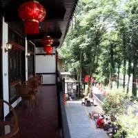 Enshi Grand Canyon Chunlun Farmstay, hotel v Enshi