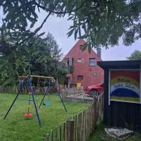 Gode Sünn, hotel Tatingban