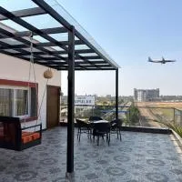 Runway Retreat Rooftop Swing, Airport View, Near Kempegowda International Airport, Hotel in Muthugadahalli