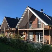 Ferienhaus Familienkoje Hannah, מלון בKrummin