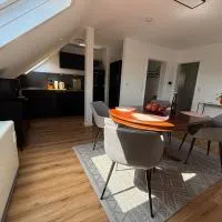 Klimatisierte 3 Zimmer Wohnung mitten im Herz von Nieder-Olm, Hotel in Nieder-Olm