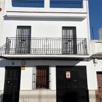 Casa en la Huertecilla, hotel din Lora del Río