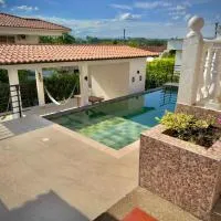 Quinta Guayacanal, hacienda la estancia, piscina, seguridad y tranquilidad，梅爾加的飯店