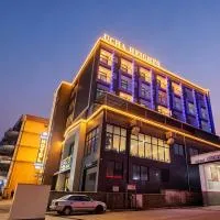 Ucha Hotel & Suites, готель у місті Кампала