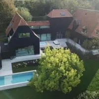 Holiday Home L'O Reine - with luxury wellness, hotel a Sint-Pieters-Leeuw
