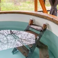 Bárka a Tiszához apartman、Tiszaugのホテル
