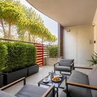 Appartamento Residence Mimose - con parcheggio e Terrazza vicino al mare, хотел в Ераклеа Маре