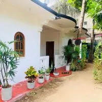Green House Holiday Villa، فندق في ترينكومالي