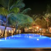 The Coconut Gardens Hotel & Restaurant, hotel di Udawalawe