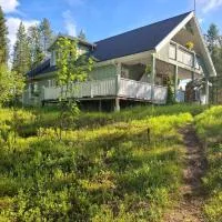 Apartment and beach sauna near KARHUNKIERROS, hotell sihtkohas Kuusamo