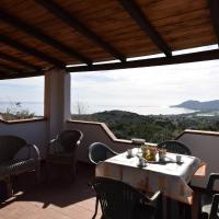 Residenza BOUNGAVILLE 12 - LE DIMORE FIORITE DI C、Capo Cominoのホテル