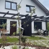 Apartament NaturalnieTu Goście od 10 roku życia Natura Klimat Cisza Spokój Ogródek Rower, hotelli kohteessa Rowy
