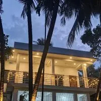Riveria Palms by Bennys Wecare Homestay & Boating, хотел в Honāvar