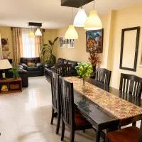 Casa amplia y cómoda con Parqueo y seguridad en ubicación estratégica, hotel en Amatitlán