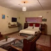 Ensuite Bedroom Near RG Mugabe Airport, hotelli kohteessa Harare