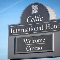 a sign for a hotel with a welcome sign at Celtic International Hotel Cardiff Airport, Barry