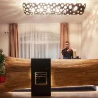 Residence AlpenHeart โรงแรมในบาดกัสไตน์
