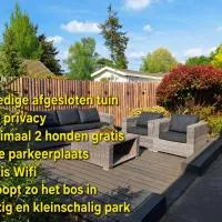 Happy Place is een modern en comfortabel chalet met een grote afgesloten tuin op de Veluwe, Recreatiepark De oude Driest, hotel en Putten