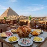 Mazaya Pyramids view inn, отель в городе Giza