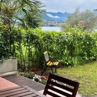 Casa lalla - charming house with garden and lake view, hotel i Fiumelatte
