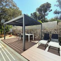 Can Andreu I apartamento a un paso de la playa, hotel din Cala Galdana