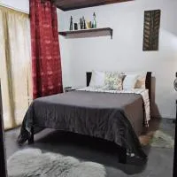 Apartamento vista al jardín, cocina externa, hôtel à Heredia