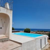 Villa Asfodelo- Piscina vista mare, hotel in Porto Ottiolu