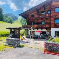 Natursport Heutal Appartements Ski-in & Ski-out, hotel em Unken