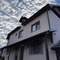 Pensiune lângă Mănăstirea Izbuc, ξενοδοχείο σε Călugări