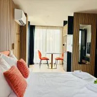 Le Nid Essentiel - Bungalow climatisé avec terrasse & parking, Hotel in Chailly-lès-Ennery