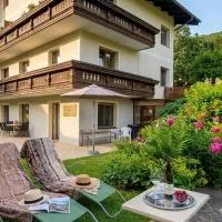 Boutique73 Suite Garden, hotel di Ossiach