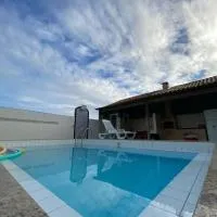 Casa c ar cond, wifi, a 5 min Orla da Lagoa Para Famílias、アラルアマのホテル