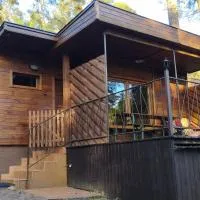 Domek letniskowy nad jeziorem Wielkie Partęczyny, готель у місті Tereszewo