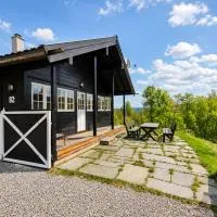 Saballie - Cosy cabin - sunny location!, hotel em Slåtto
