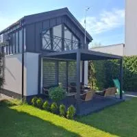 Olsztyn में, होटल TINY HOUSE domek do wynajęcia
