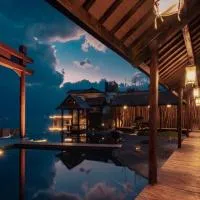 Dali Yinli Mid mountain Sunset Seaview Chinese Courtyard(Eehai Webbi Village) – hotel w mieście Dali