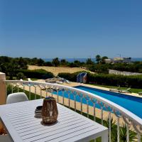 Marinha Coast Vue mer, rooftop, piscine, &agrave; Praia da Marinha, kh&aacute;ch sạn ở Lagoa